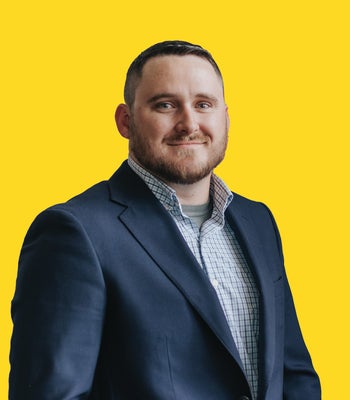 Portrait of Joey Brinkoetter, Broker/Agent.